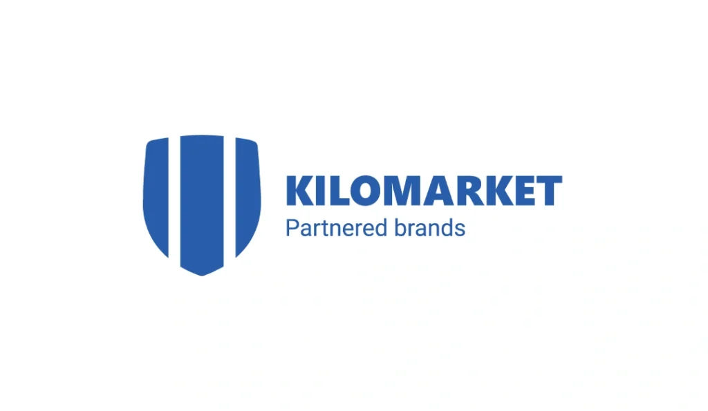 Blue shield logo with “Kilomarket Partnered Brands” text in bold and clean fonts
